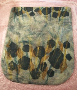 Turquoise Bag laid out before it has been felted